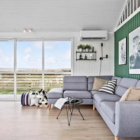 Holiday home Lovely In